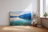 Sinus Art Wandbild 120x80cm Die Spiegelung im Wasser und die klaren Steine im Vordergrund vermitteln Ruhe und Weite