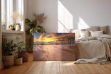 Sinus Art Wandbild 120x80cm Dramatische Szene mit bewegtem Wasser und historischem Holzsteg bei Sonnenuntergang