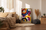 Paul Sinus Wandbild in 40x60cm The Chromatic Orbit – Abstrakte Kreisformationen in kräftigem Orange, Blau, Violett, Rot und Schwarz mit dynamischen Farbspritzern