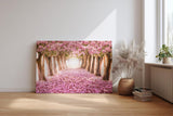 Sinus Art Wandbild 120x80cm Märchenhafter Weg unter rosa Blütenbäumen mit Perspektive und Tiefe