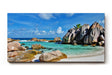 Sinus Art Wandbild 120x80cm Türkises Wasser, weißer Sand und markante Felsen – Urlaubsstimmung pur auf Leinwand