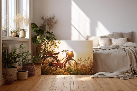 Sinus Art Wandbild 120x80cm Rotes Fahrrad im goldenen Gegenlicht einer Sommerwiese mit romantischem Flair