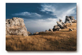 Sinus Art Wandbild 120x80cm Markante Felsformationen unter blauem Himmel in dramatischer Weite