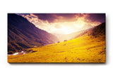 Sinus Art Wandbild 120x80cm Sonnenuntergang taucht Bergwiese in goldenes Licht mit dramatischem Himmel