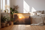 Sinus Art Wandbild 120x80cm Dramatische Landschaft mit Felsformationen im Gegenlicht der aufgehenden Sonne erzeugt Weite und Ruhe