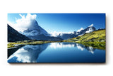Sinus Art Wandbild 120x80cm Majestätisches Matterhorn reflektiert sich in klarem Bergsee unter blauem Himmel