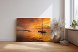 Sinus Art Wandbild 120x80cm Silhouetten von Segelbooten im warmen Abendlicht – maritimes Motiv voller Ruhe und Tiefe