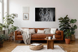 Sinus Art Wandbild 120x80cm Der intensive Blick des Tigers mit leuchtend blauen Augen schafft eine starke Präsenz