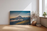Sinus Art Wandbild 120x80cm Alpenmassiv im goldenen Licht des Sonnenaufgangs über grünen Hügeln