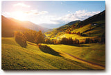 Sinus Art Wandbild 120x80cm Grüne Hügel unter strahlender Sonne mit leuchtenden Bäumen und weiter Perspektive