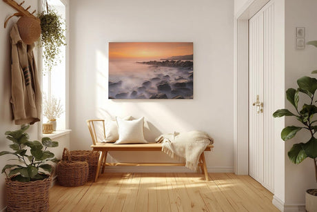 Sinus Art Wandbild 120x80cm Vernebelte Felsküste mit warmem Sonnenlicht – beruhigend und ästhetisch