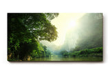 Sinus Art Wandbild 120x80cm Stimmungsvoller Flusslauf im Tal mit Sonnenaufgang und dichter Vegetation