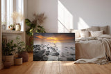 Sinus Art Wandbild 120x80cm Ruhiges Küstenmotiv mit Felsen im Wasser und goldenem Sonnenuntergang