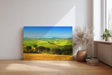 Sinus Art Wandbild 120x80cm Sanfte Hügel der Toskana mit Zypressen und Feldern unter strahlend blauem Himmel