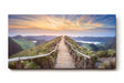 Sinus Art Wandbild 120x80cm Panoramaweg mit Geländer auf Höhenzug im goldenen Abendlicht für weite Raumwirkung