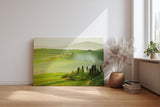 Sinus Art Wandbild 120x80cm Traumhafte Aussicht über die grünen Hügel der Toskana im frühen Sonnenlicht