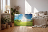 Sinus Art Wandbild 120x80cm Weite Frühlingswiese mit gelben Blüten und strahlendem Himmel für fröhliche Atmosphäre