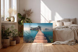 Sinus Art Wandbild 120x80cm Holzsteg führt zur Insel im klaren Meer – Symbol für Freiheit und Fernweh
