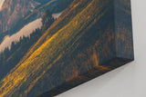 Sinus Art Wandbild 120x80cm Alpenmassiv im goldenen Licht des Sonnenaufgangs über grünen Hügeln
