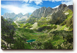 Sinus Art Wandbild 120x80cm Atemberaubendes Hochgebirgspanorama mit grünen Hängen und türkisfarbenem Bergsee im Tal