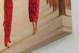 Sinus Art Wandbild 120x80cm Drei Mönche mit traditionellen Schirmen in rhythmischer Komposition