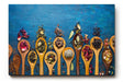Sinus Art Wandbild 120x80cm Bunte Gewürze auf Holzlöffeln vor rustikalem Hintergrund – kulinarisch und stilvoll
