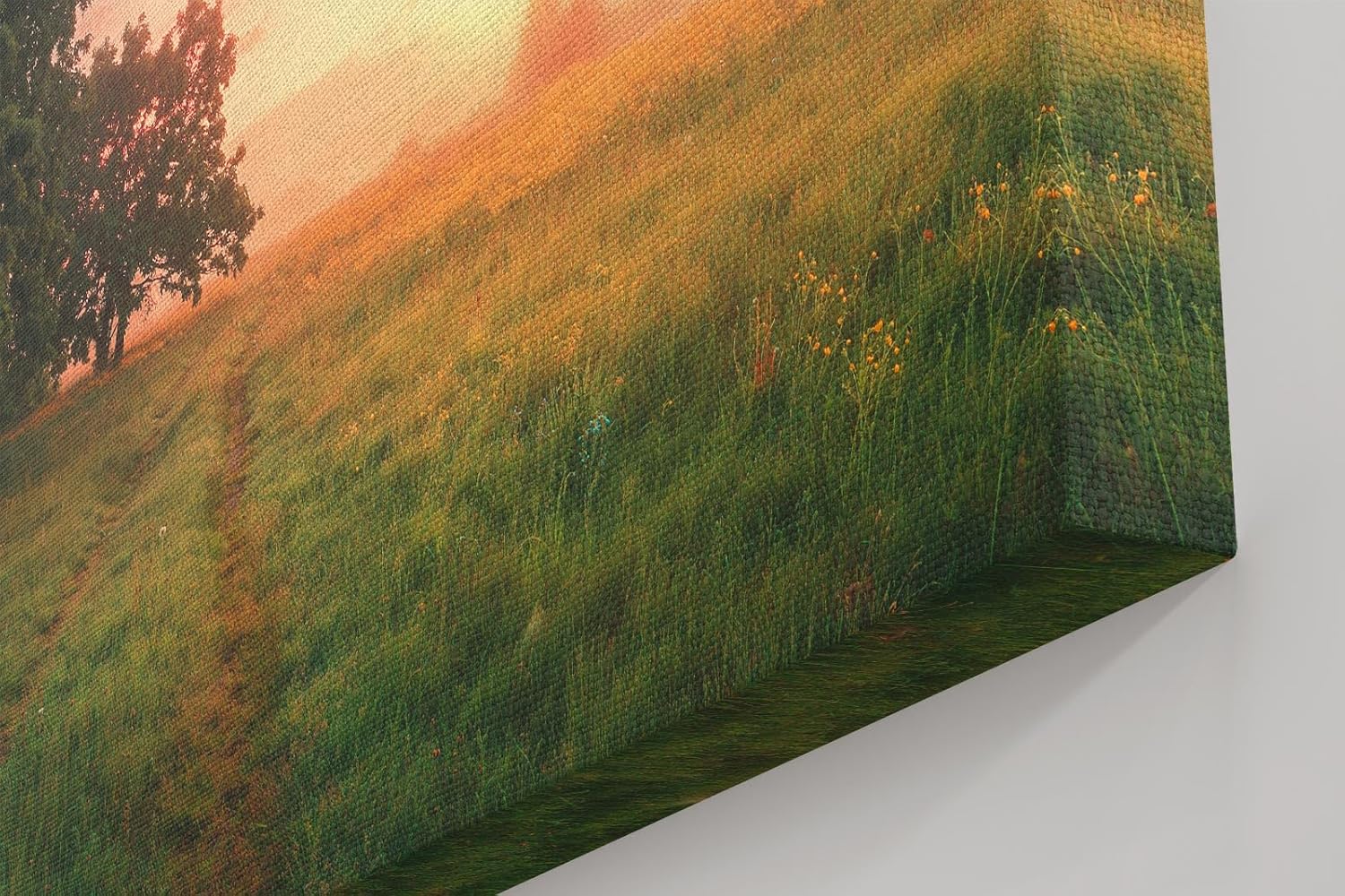 Sinus Art Wandbild 120x80cm Grüne Wiese im goldenen Morgenlicht mit Baumgruppe für eine friedliche Raumwirkung
