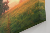 Sinus Art Wandbild 120x80cm Grüne Wiese im goldenen Morgenlicht mit Baumgruppe für eine friedliche Raumwirkung
