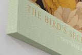Paul Sinus Wandbild in 40x60cm The Bird's Secret – Poetisches Porträt einer Frau mit Vogel und floraler Umrahmung in sanften Farbtönen
