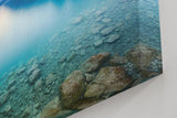 Sinus Art Wandbild 120x80cm Die Spiegelung im Wasser und die klaren Steine im Vordergrund vermitteln Ruhe und Weite