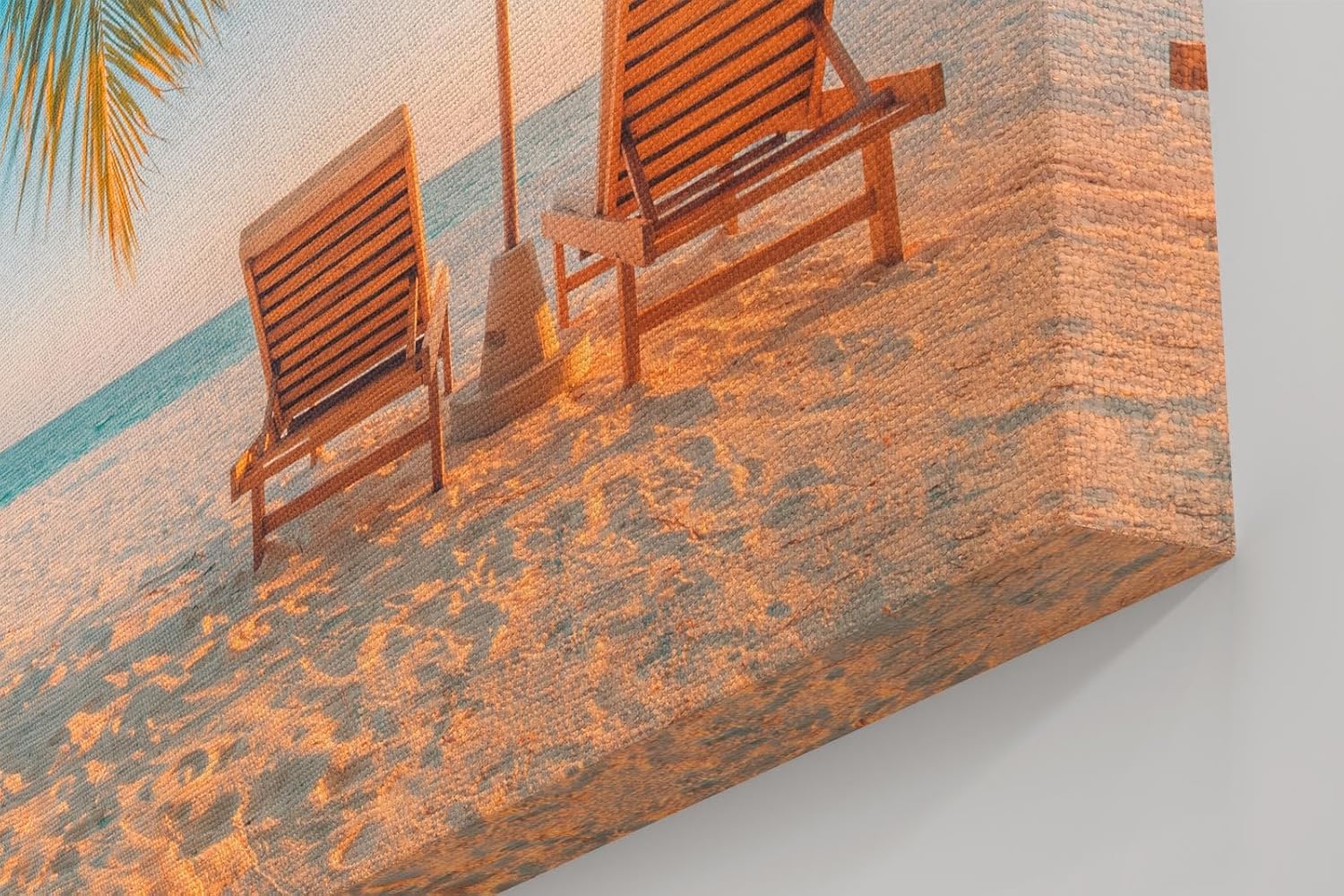 Sinus Art Wandbild 120x80cm Zwei Sonnenliegen am Palmenstrand mit Schirm vor blauem Himmel für entspannte Wirkung