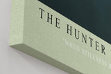 Paul Sinus Wandbild in 40x60cm The Hunter in the Dark – Leopard im Schatten dichter Blätter mit intensiven Augen