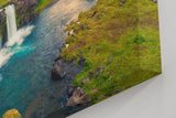 Sinus Art Wandbild 120x80cm Spektakuläres Zusammenspiel von Wasserfall, Berg und Himmel in Island