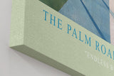 Paul Sinus Wandbild in 40x60cm The Palm Road mit malerischen Palmen und blauem Gebirgsblick in endloser Tiefe für stilvolle Raumgestaltung