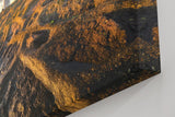 Sinus Art Wandbild 120x80cm Faszinierendes Motiv eines Leuchtturms auf strukturierten Felsen im Abendlicht