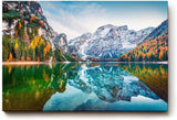 Sinus Art Wandbild 120x80cm Bunt gefärbte Herbstbäume spiegeln sich im ruhigen Bergsee vor alpiner Kulisse