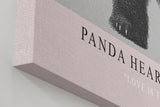 Paul Sinus Wandbild in 40x60cm Panda Heart Panda mit Herzgeste schwarz-weiße Tierkunst auf Leinwand