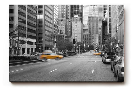 Sinus Art Wandbild 120x80cm Schwarz-Weiß-Straßenszene mit leuchtenden gelben Taxis – dynamisch, stilvoll und ikonisch