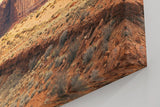 Sinus Art Wandbild 120x80cm Faszinierende Gesteinsformationen unter goldenem Himmel in Western-Atmosphäre
