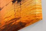 Sinus Art Wandbild 120x80cm Silhouetten von Segelbooten im warmen Abendlicht – maritimes Motiv voller Ruhe und Tiefe