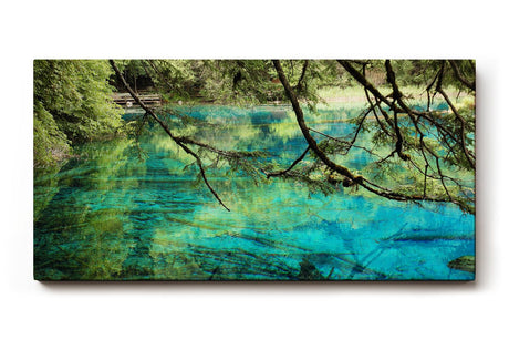 Sinus Art Wandbild 120x80cm Die Äste im Vordergrund und das klare Wasser erzeugen Tiefe und beruhigende Natürlichkeit