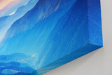 Sinus Art Wandbild 120x80cm Faszinierende Berglandschaft in verschiedenen Blauabstufungen mit goldener Sonne