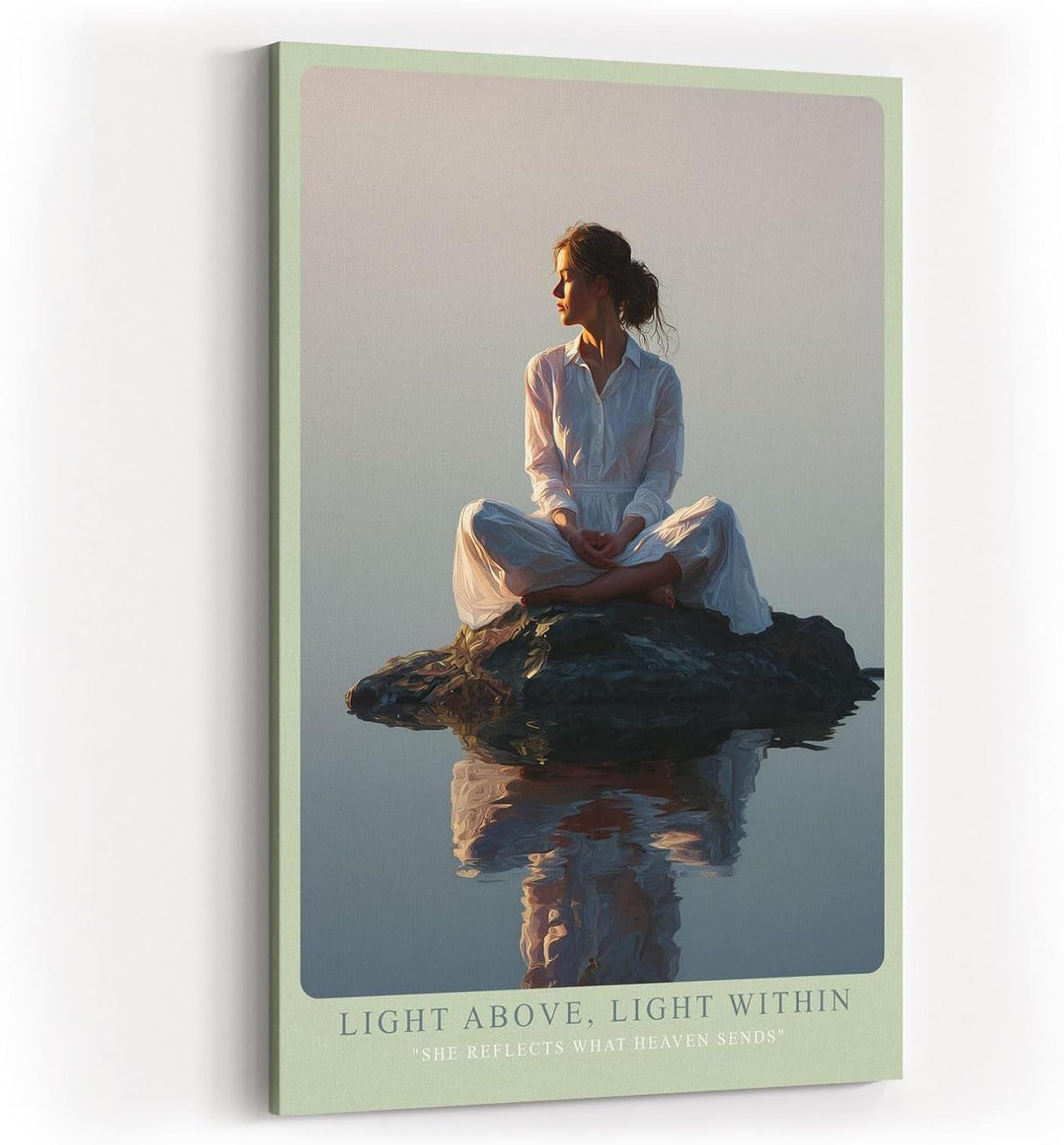 Paul Sinus Wandbild in 40x60cm Light Above, Light Within – Meditatives Porträt einer Frau in weißem Gewand, sitzend auf einem Felsen im stillen Wasser bei Sonnenaufgang