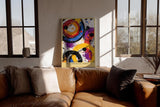 Paul Sinus Wandbild in 40x60cm The Chromatic Orbit – Abstrakte Kreisformationen in kräftigem Orange, Blau, Violett, Rot und Schwarz mit dynamischen Farbspritzern