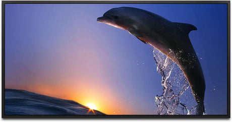 Delfin im Meer mit Wellen ca. 130x70cm Wandbild inklusive Schattenfugenrahmen schwarz - Panorama Leinwand Bild XXL Format Wandbilder Wohnzimmer Wohnung Deko Kunstdrucke