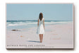 Paul Sinus Wandbild Between Waves and Longing – Frau im weißen Kleid am Meer