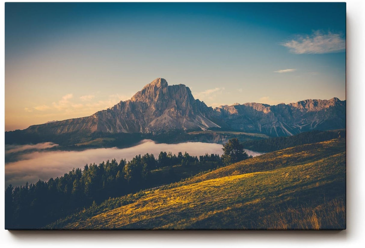 Sinus Art Wandbild 120x80cm Alpenmassiv im goldenen Licht des Sonnenaufgangs über grünen Hügeln
