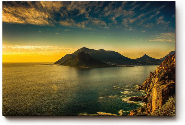 Sinus Art Wandbild 120x80cm Dramatisches Küstenpanorama bei Sonnenuntergang – ruhig, weit und eindrucksvoll