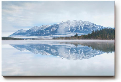 Sinus Art Wandbild 120x80cm Ruhige Alpenlandschaft mit schneebedeckten Bergen und klarer Wasserfläche