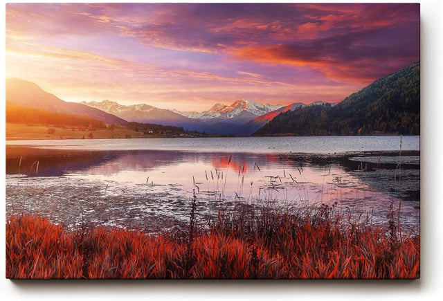 Sinus Art Wandbild 120x80cm See mit reflektierendem Himmel vor verschneiten Bergen – kontrastreich und lebendig